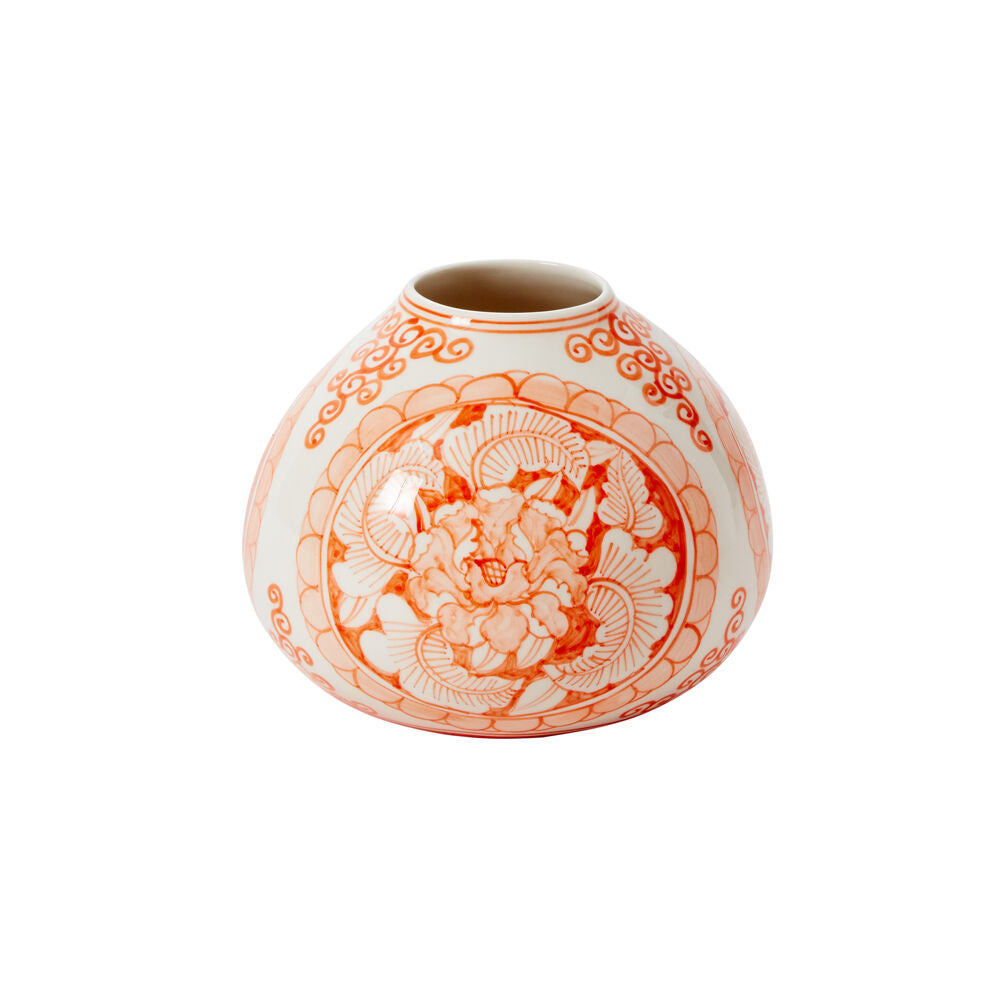 Decorative vase with orange floral patterns on a white background